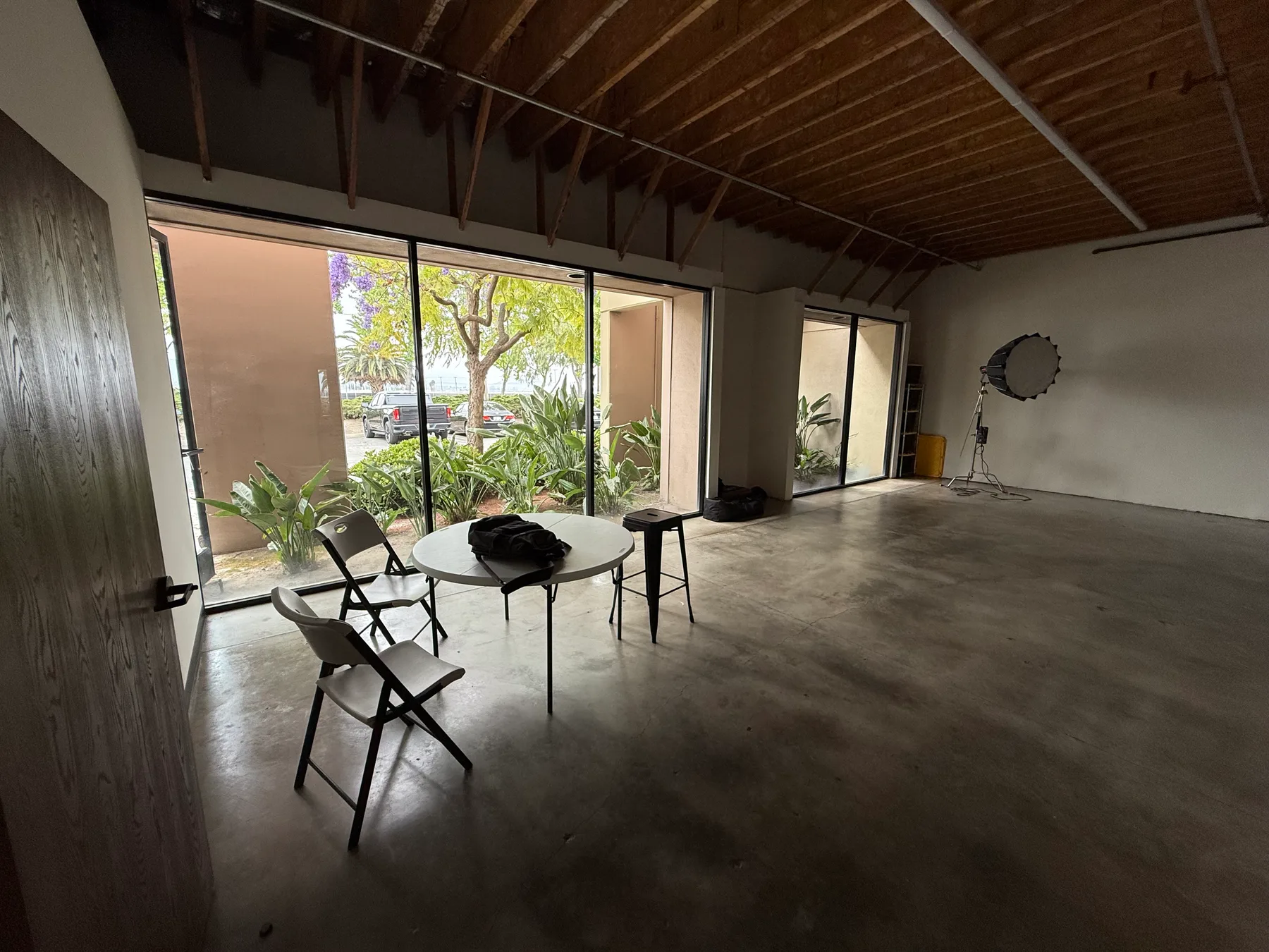 Open Studio 591 floor with large windows and natural daylight