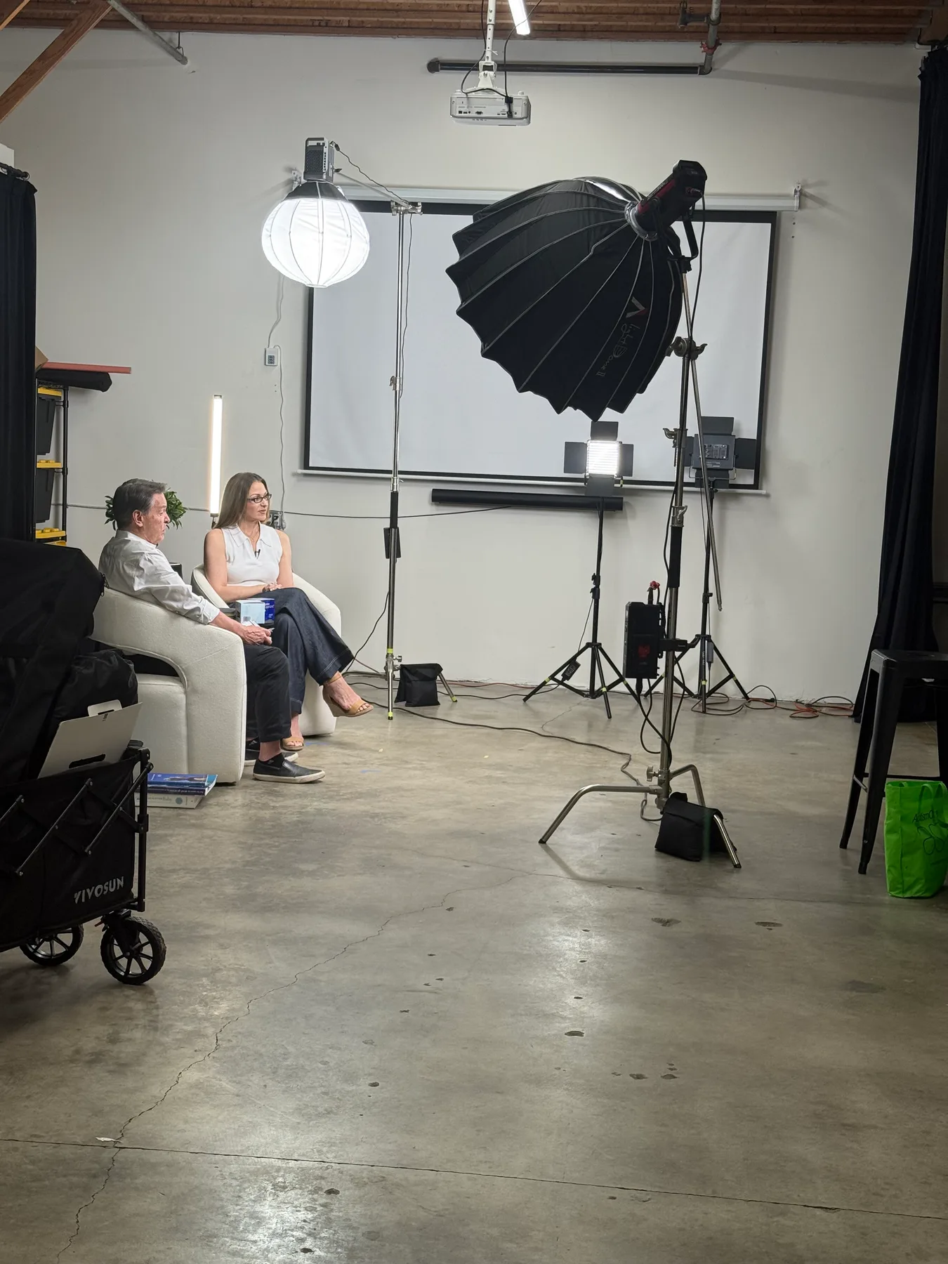 Two guests seated for an interview with studio lighting in Camarillo